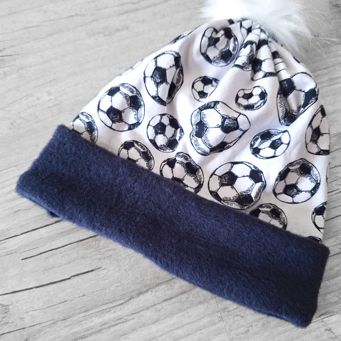 Bonnet uni ou à motifs et à pompon: chaud, doux et fourré à l'intérieur en bleu marine, dès la naissance à enfant