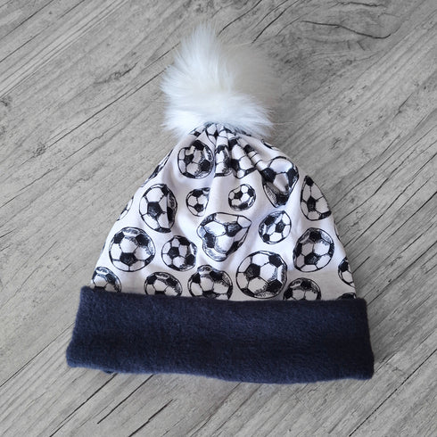 Bonnet uni ou à motifs et à pompon: chaud, doux et fourré à l'intérieur en bleu marine, dès la naissance à enfant