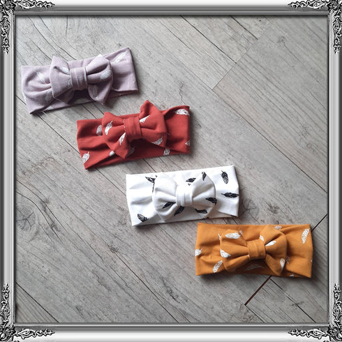 Bandeau nœud plume en jersey extensible 4 couleurs